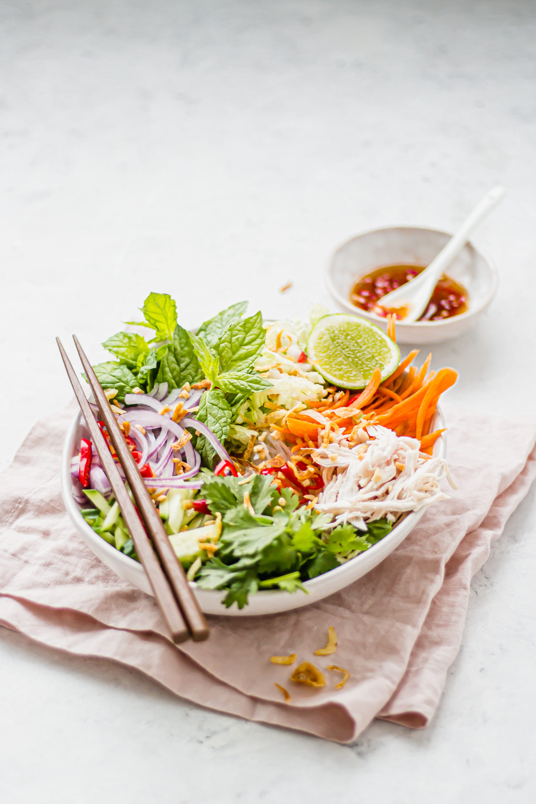 Vietnamese salad with a side of dressing