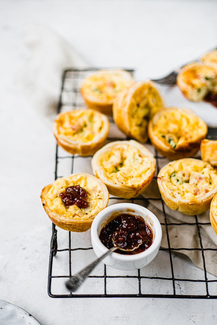 Close up bacon and cheddar mini quiches