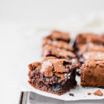 Front on view chewy, gooey choc blueberry brownies