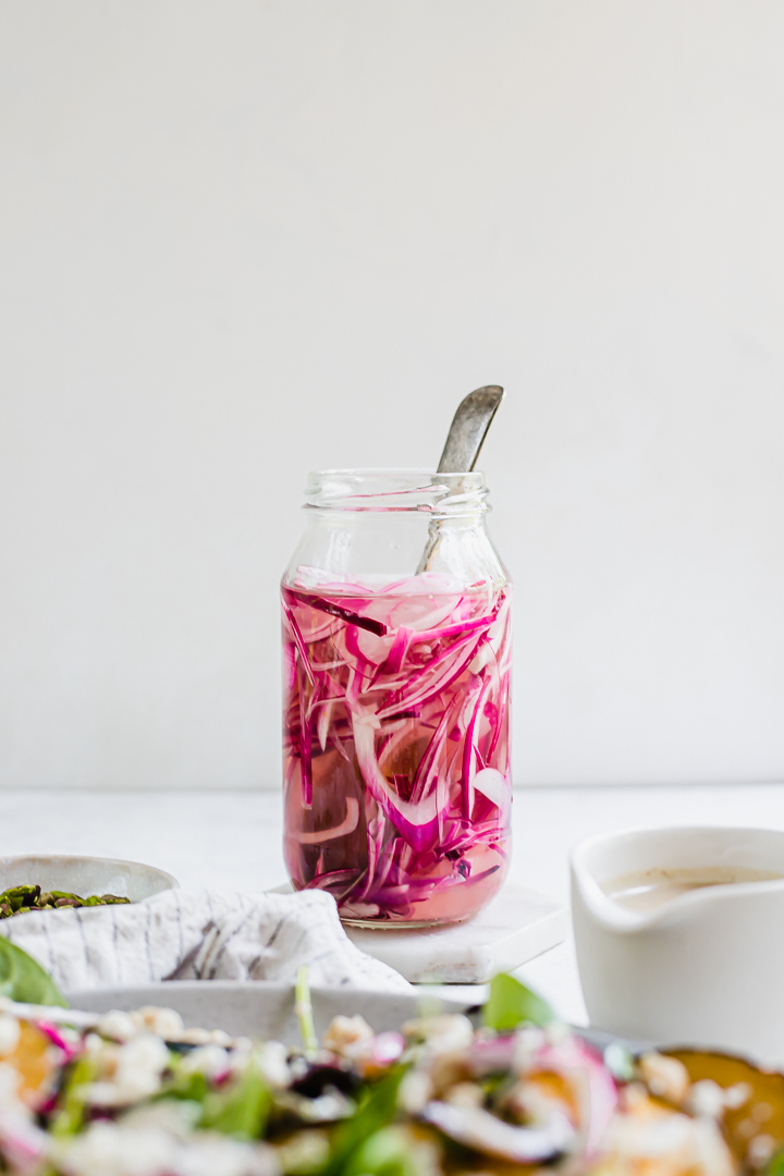 A jar of pickled red onions for the roast pumpkin and chickpea salad