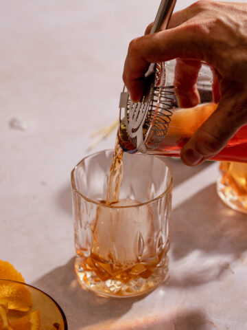 Pouring cinnamon old fashioned
