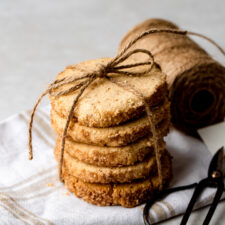 A stack of brown butter cinnamon shortbread wrapped in twine